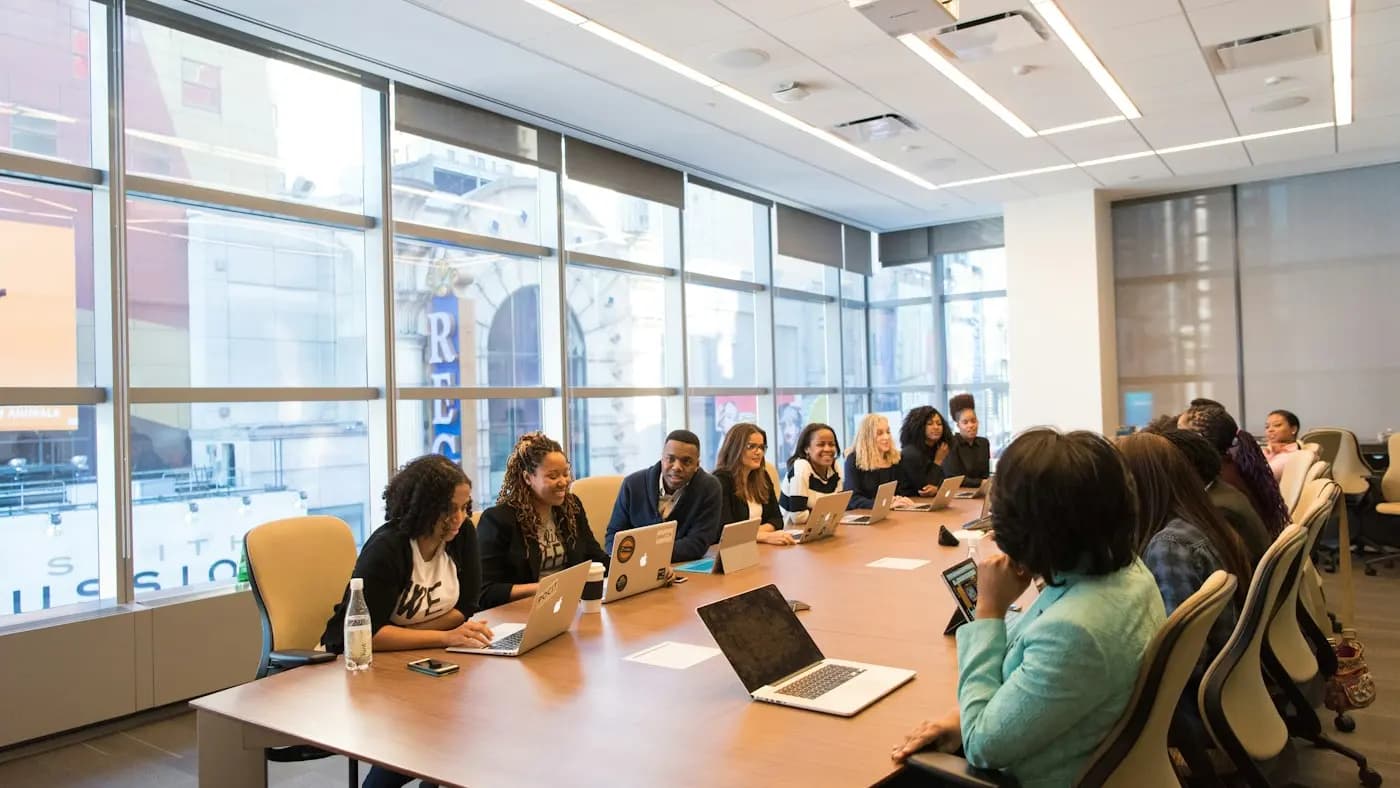 Team around a long conference table
